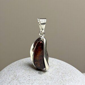 Amber Pendant With Sterling Silver Setting & Unique Inclusions